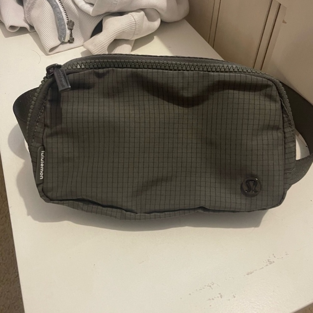 Like new belt bag carob brown grid belt bag!